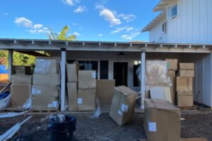 Maui Project cabinet boxes stacked on lanai