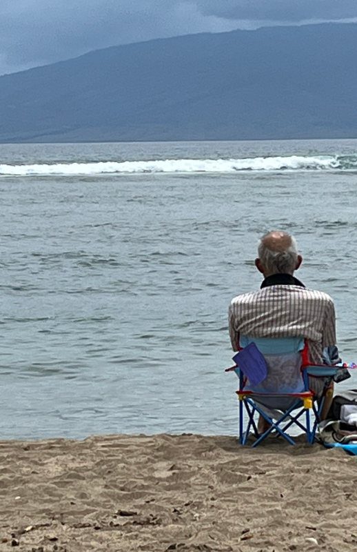 Man sitting on Maui beach